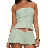 Women's green bandeau tube top and matching plaid shorts set.